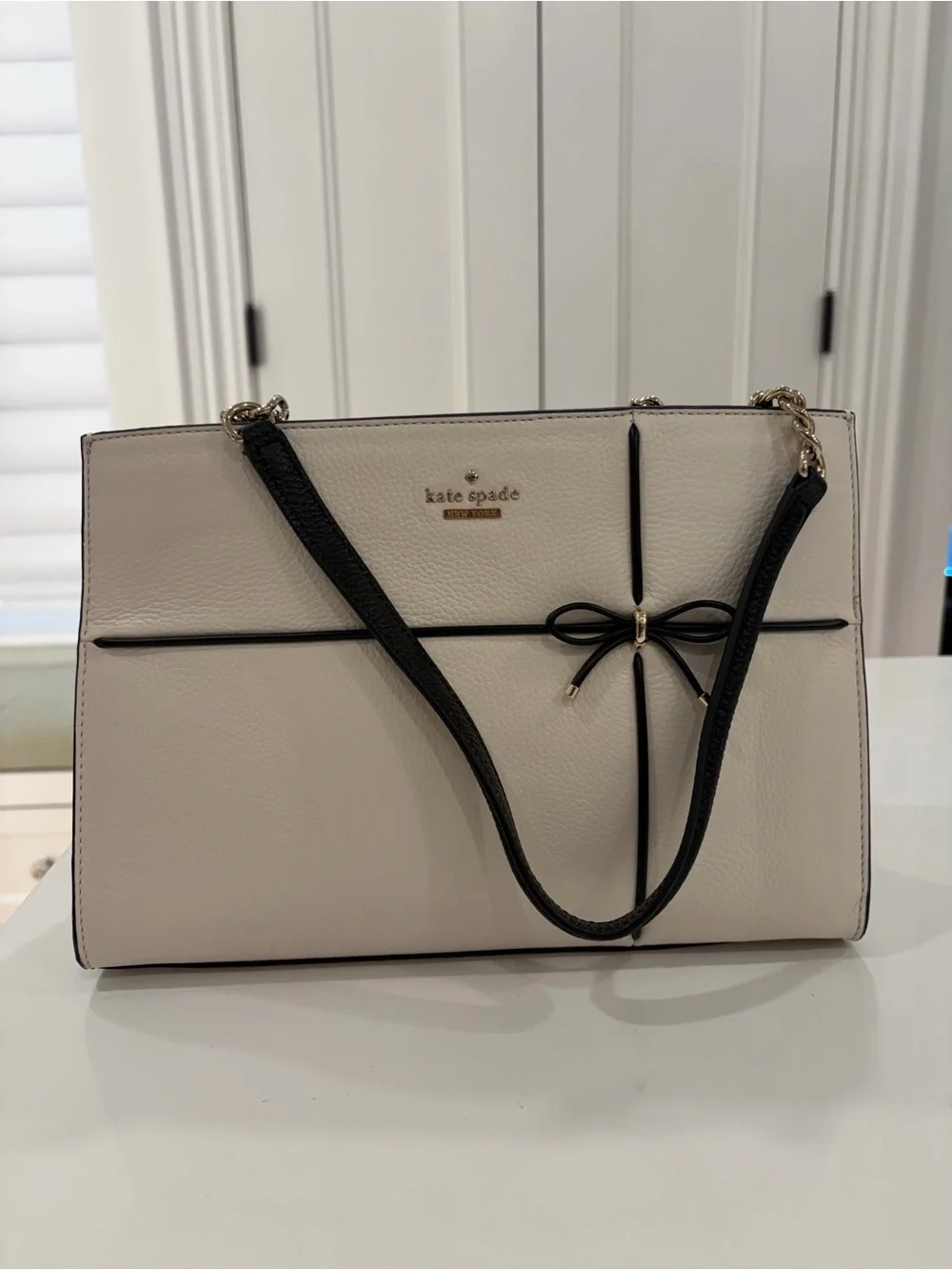 kate spade Cream Shoulder Bag with Black Trim and Bow Detail
